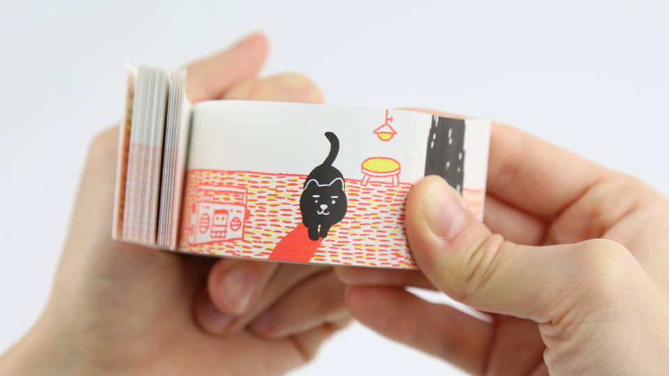 Cute cat flip book &quot;In a Kitten&#39;s Way of Greeting&quot; by Japanese artist Harumin Asao, published by Seigensha Art Publishing in 2011.