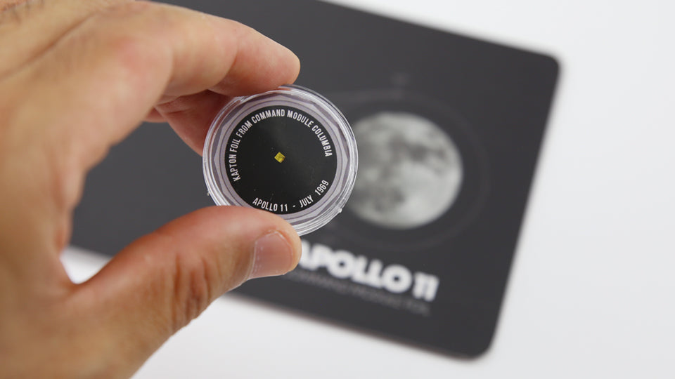 APOLLO 11 FOIL BUNDLE - Exclusive bundle that includes a real fragment of mission-flown Kapton Foil that protected the Columbia Command Module during its re-entry to Earth. A unique collector&#39;s item.